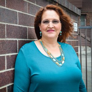 Carma - turquoise headshot