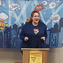 Carma speaking at the book launch party